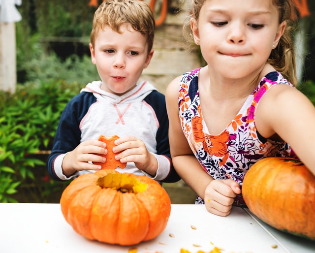 kids with pumpkins